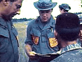 Photo of SF Captain Richard M. Rees, JCRC FRT 6 (center), on the left is SF Lieutenant Colonel Sully de Fontaine, commander, Control Team B, two days before the unarmed JCRC team was ambushed.